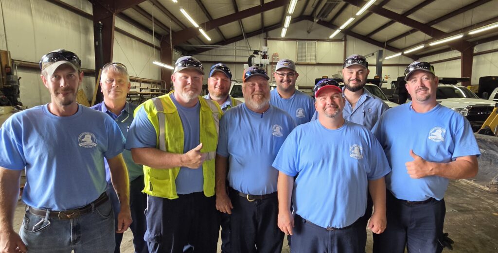 Spring Clean up crew posing for a group photo.
